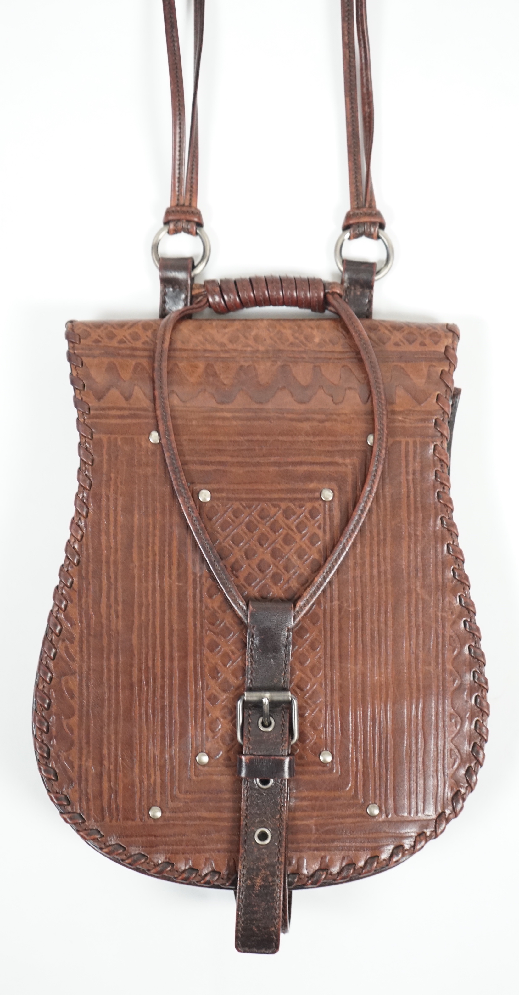 A vintage Yves Saint Laurent rive gauche embossed brown leather satchel style cross over bag, width 17cm, height 25cm, depth 3cm